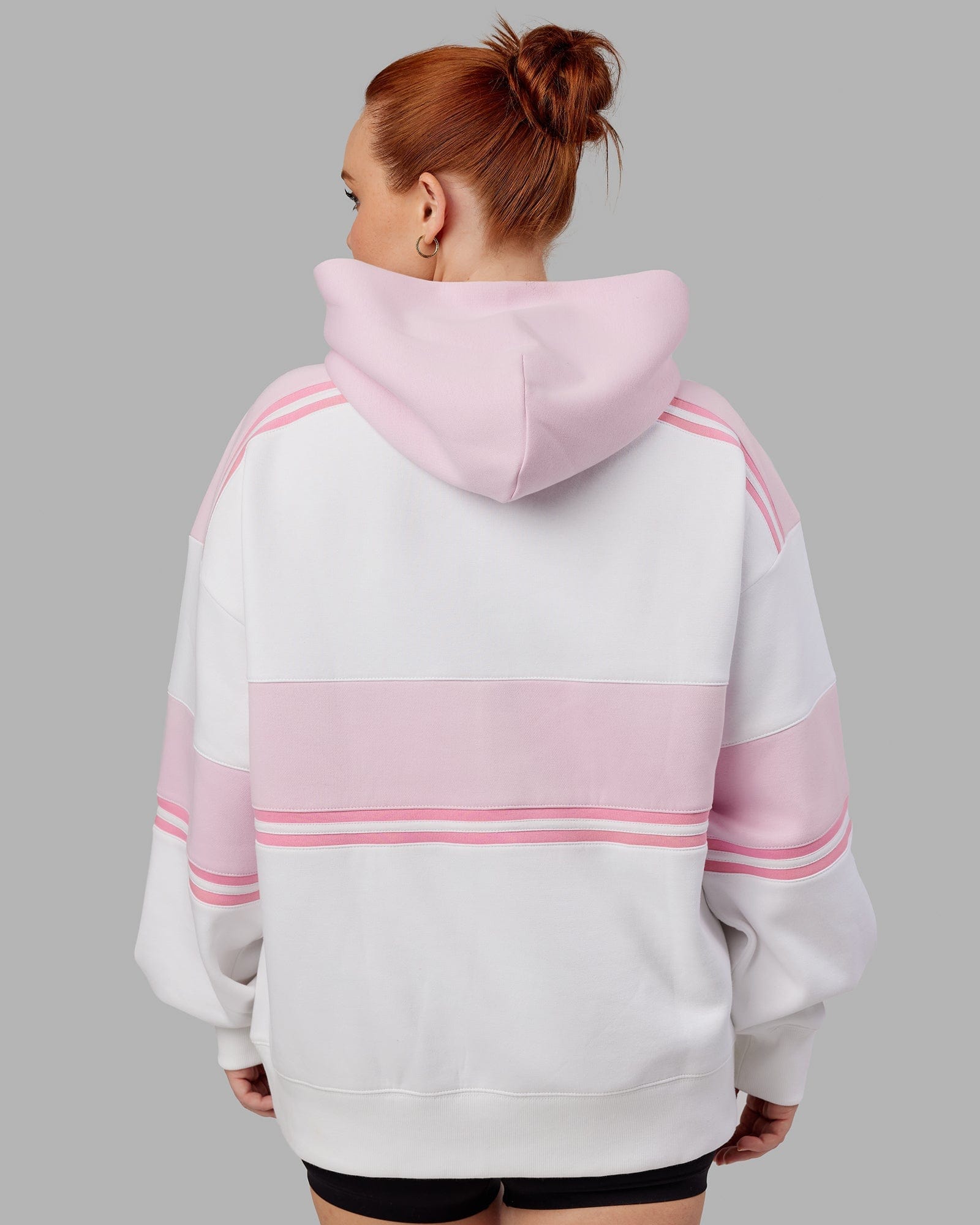 Model wearing A-Team Hoodie Oversize - White-Petal Pink