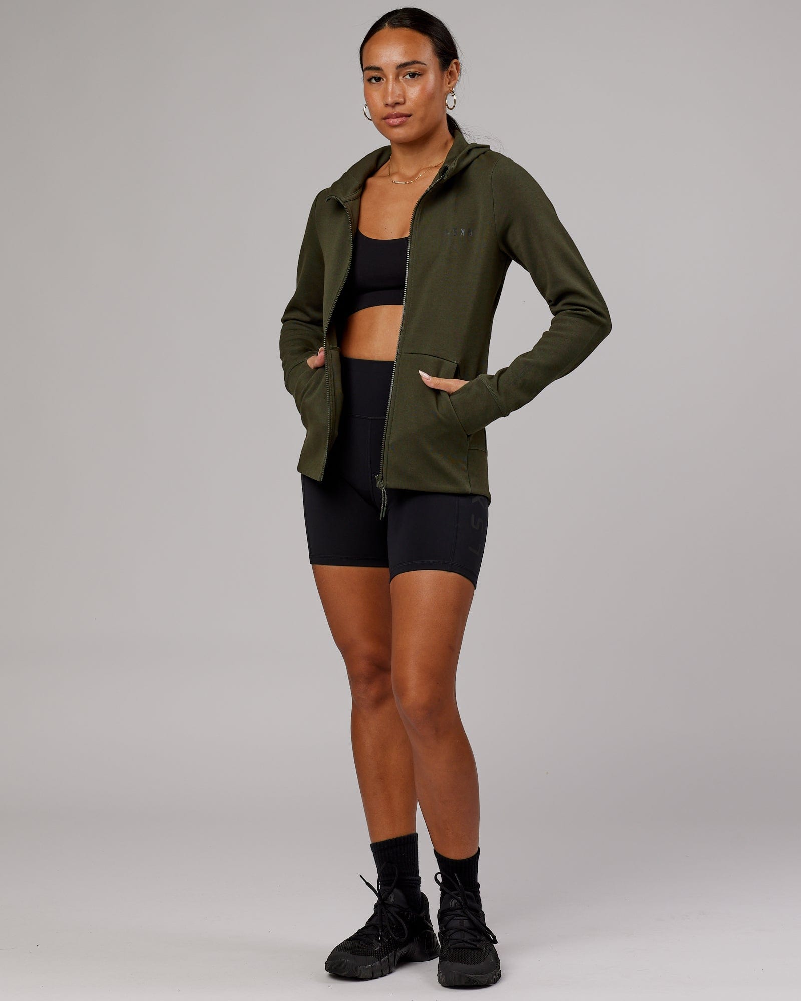 Model wearing Athlete ForgedFleece Zip Through Hoodie - Forest Night