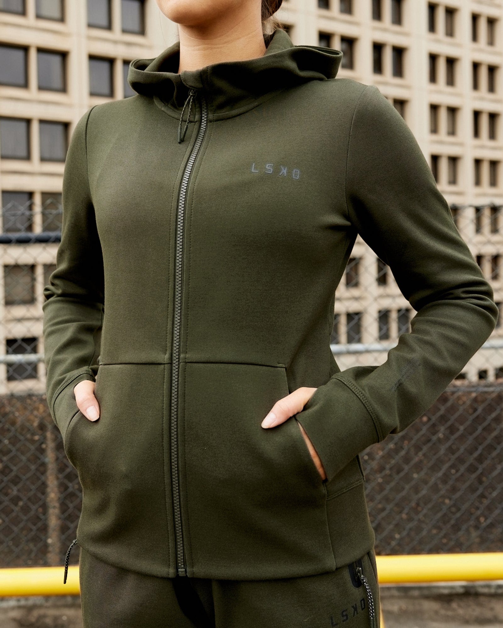 Model wearing Athlete ForgedFleece Zip Through Hoodie - Forest Night