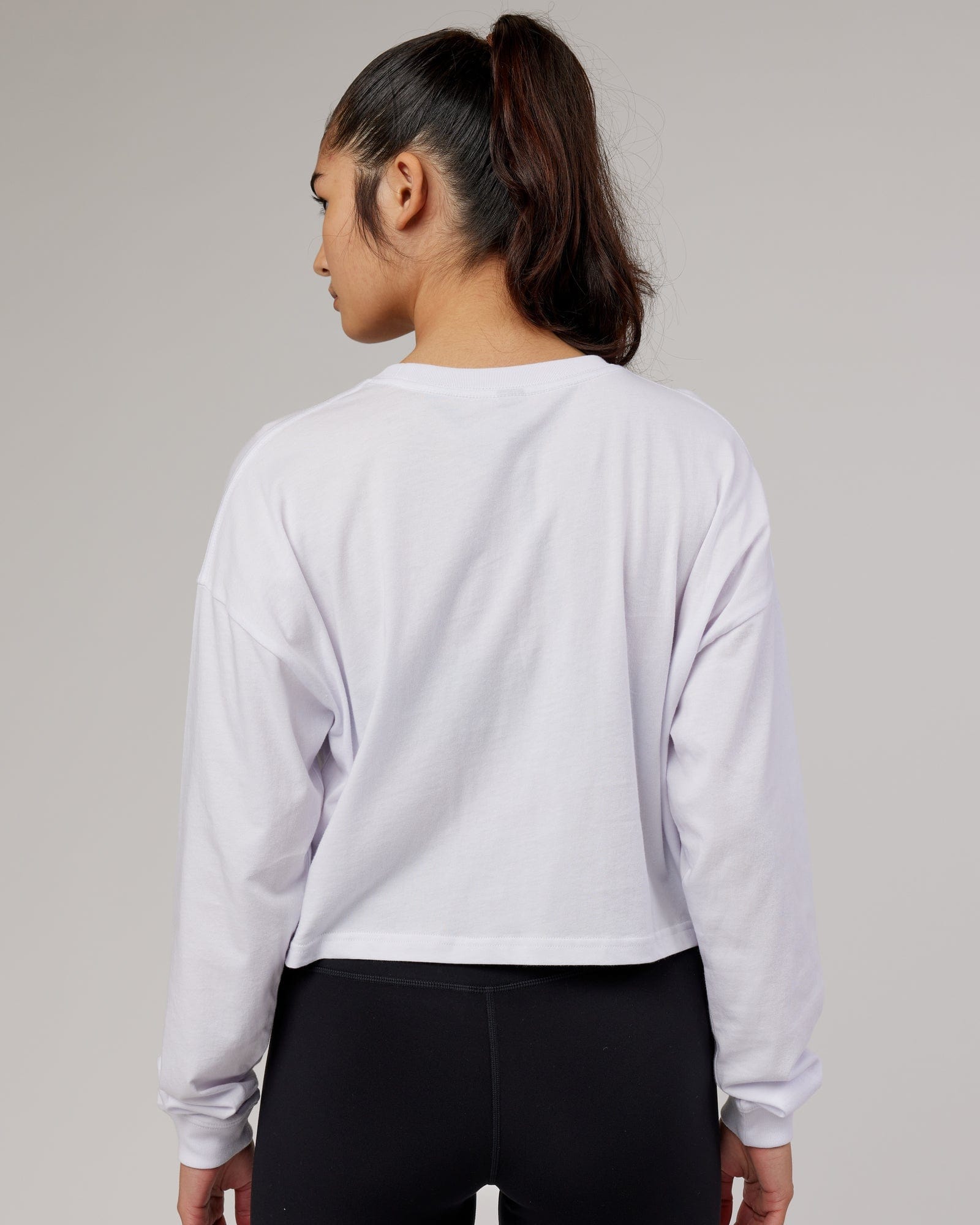 Model wearing Stacks Up LS Tee - White