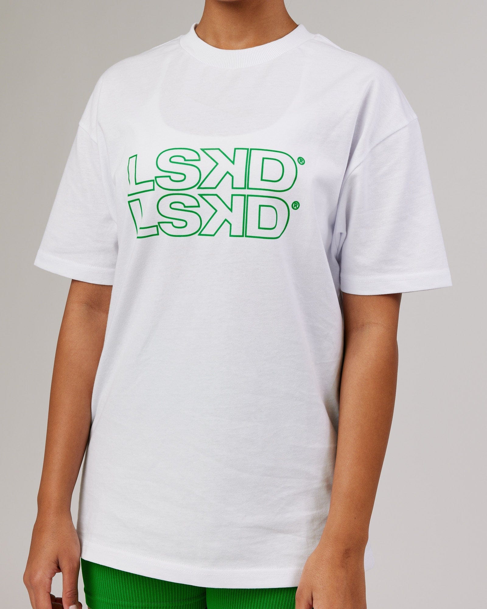 Model wearing Unisex Stacks Up Heavyweight Oversize Tee - White-Vivid Green