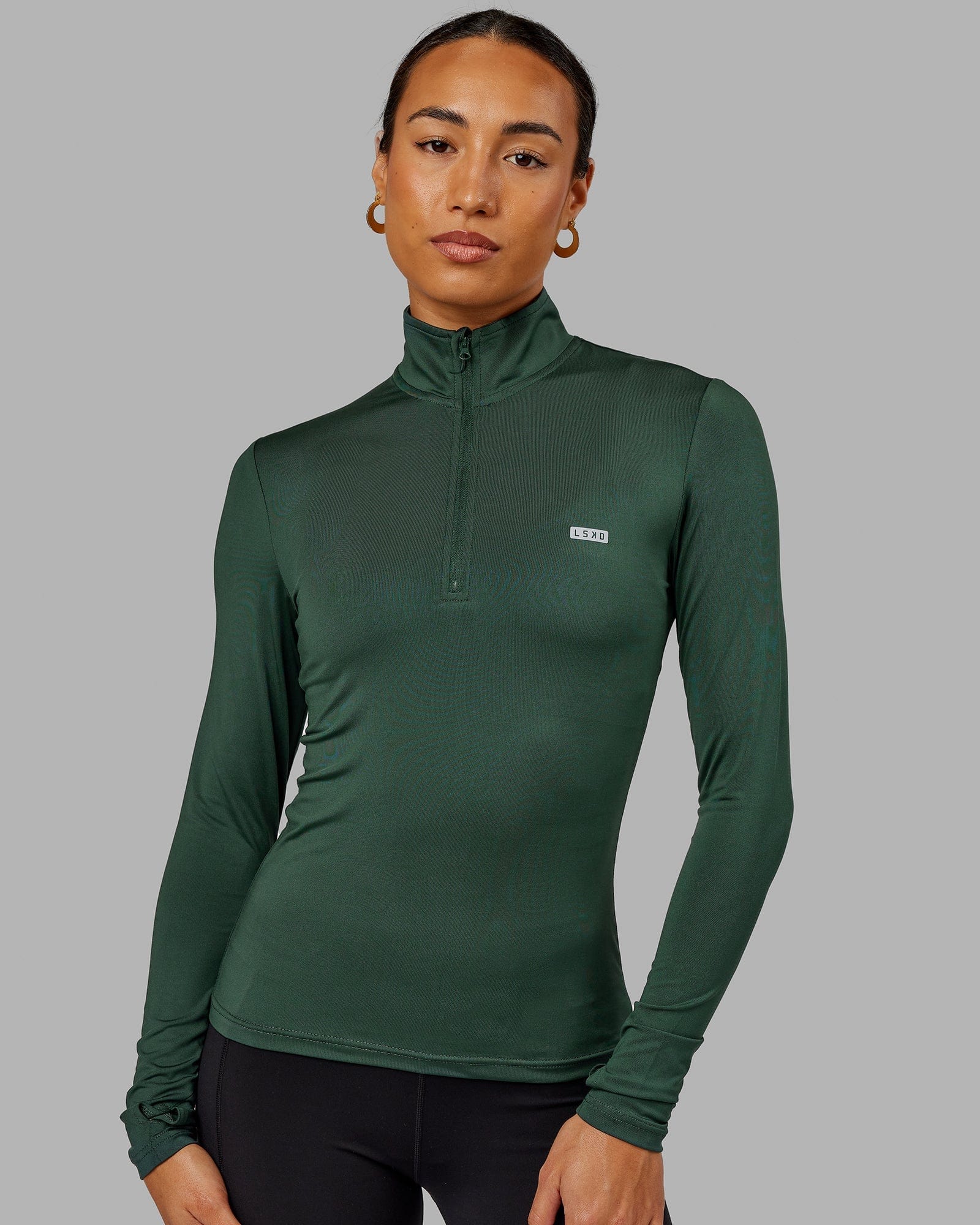 Model wearing Streamlined 1/4 Zip LS Top - Vital Green