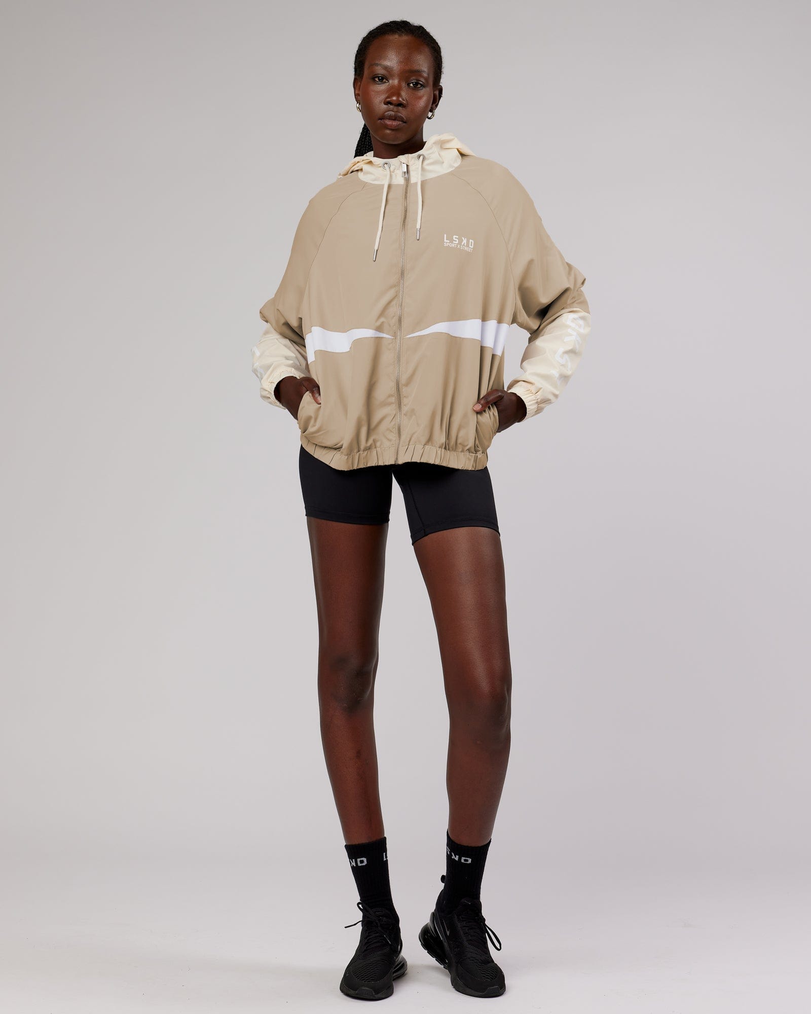 Model wearing Trackside Jacket - Light Fawn