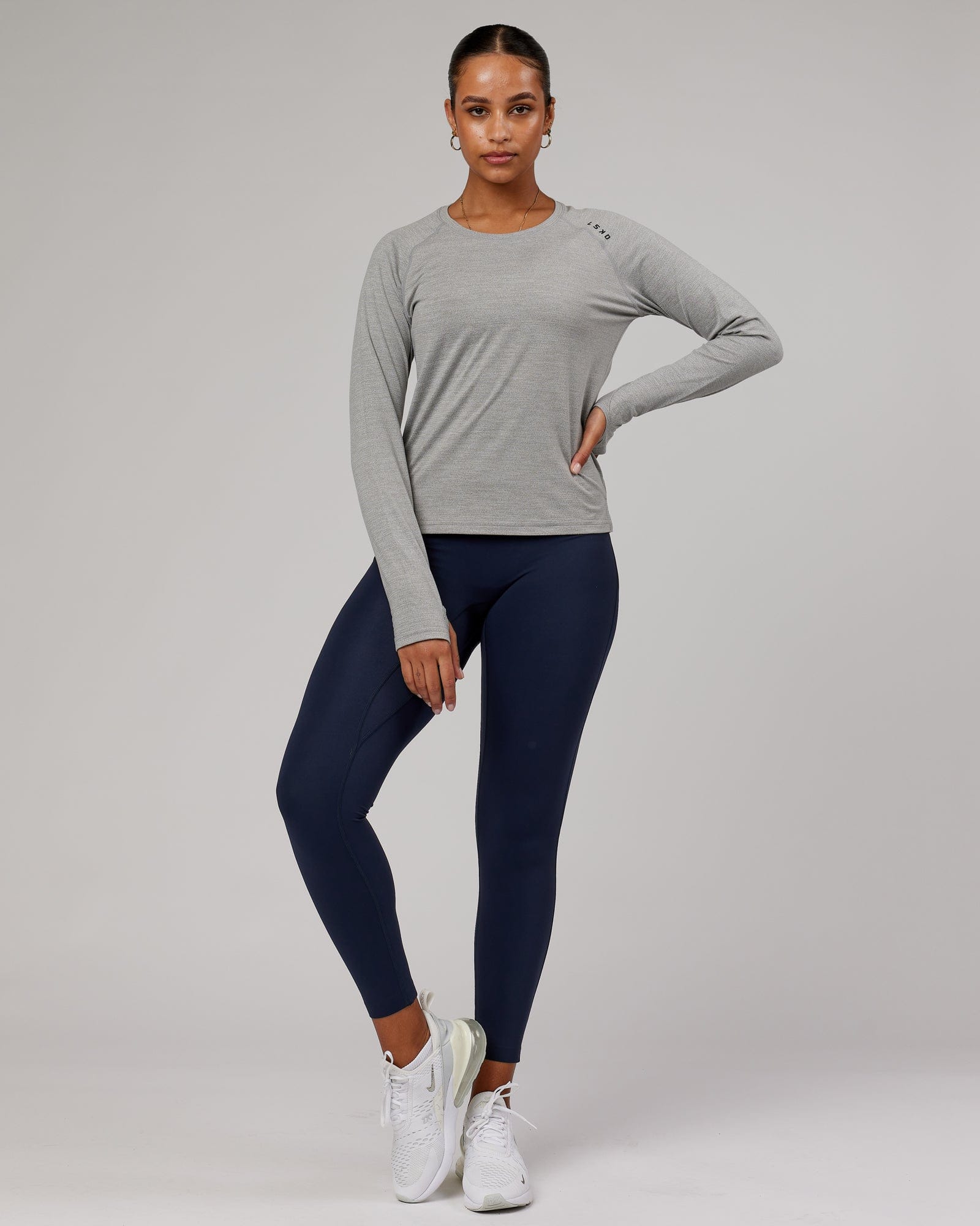 Model wearing Perform VapourFLX LS Tee - Lt Grey Marl