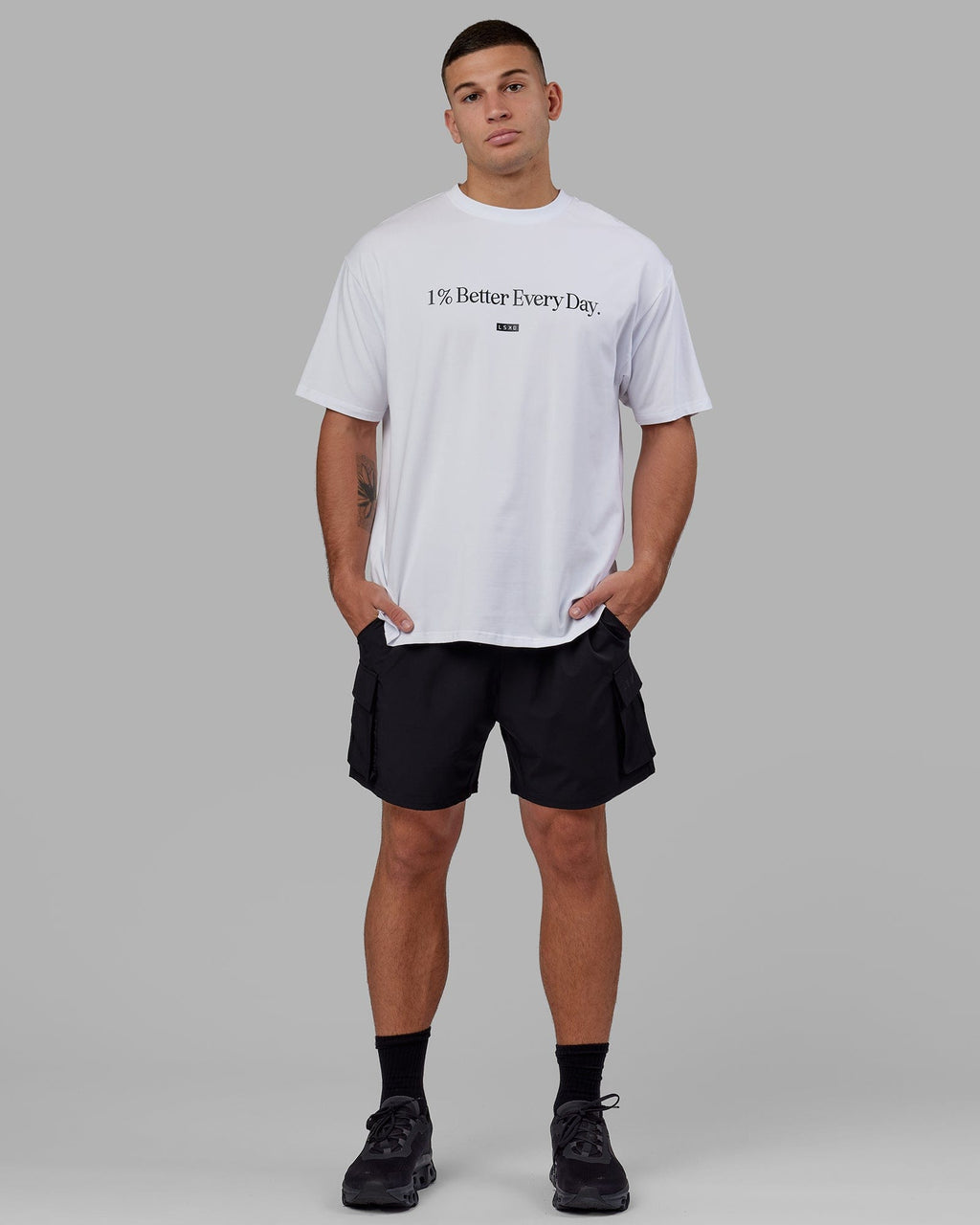 Man wearing Unisex 1% Better FLXCotton Tee Oversize - White