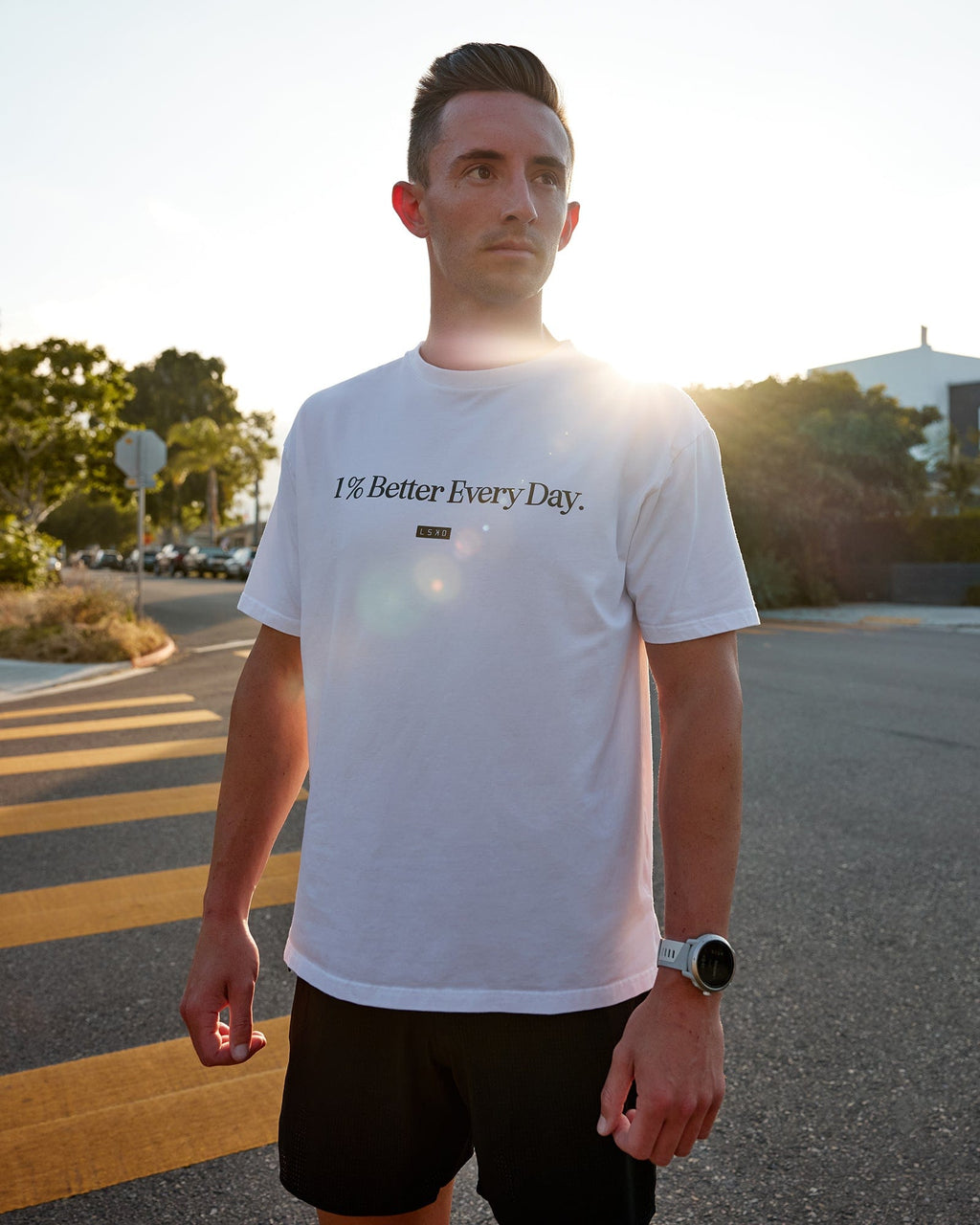 Man wearing Unisex 1% Better FLXCotton Tee Oversize - White