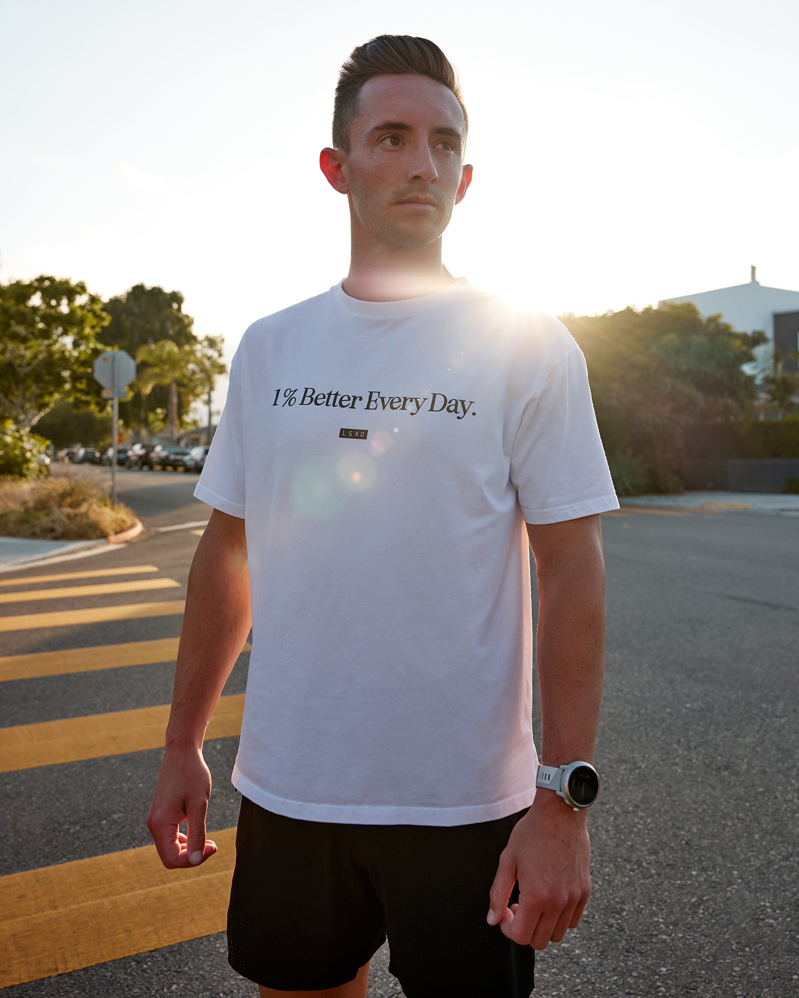 Man wearing Unisex 1% Better FLXCotton Tee Oversize - White