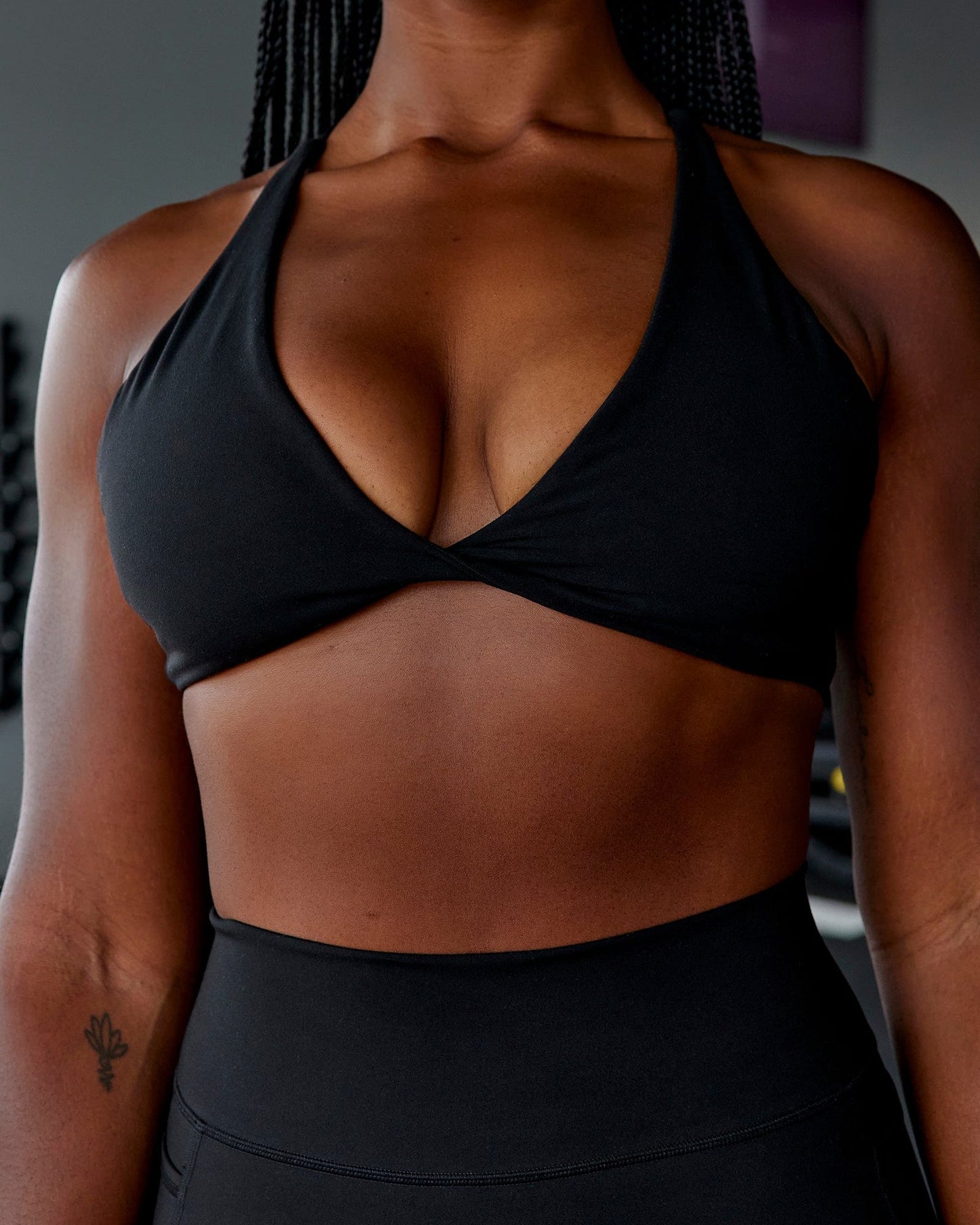 Woman wearing Agile Sports Bra - Black