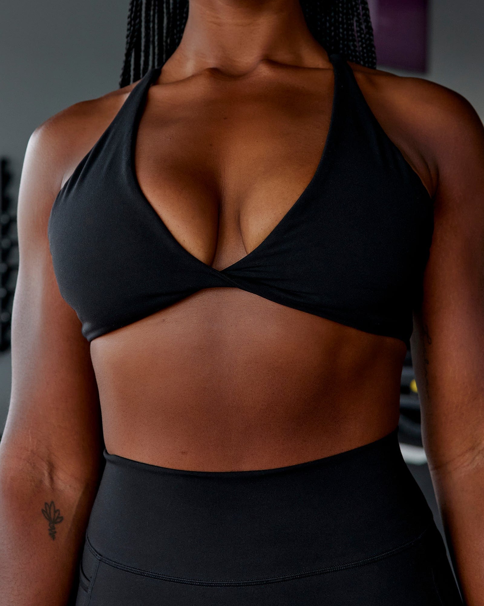 Woman wearing Agile Sports Bra - Black