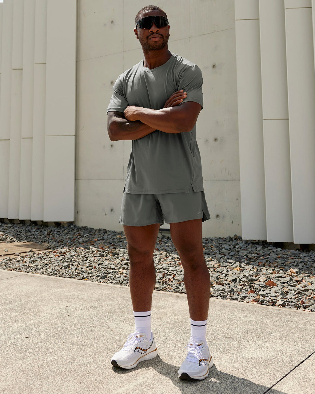 Man wearing Pace 5" Lined Performance Shorts - Graphite-Reflective