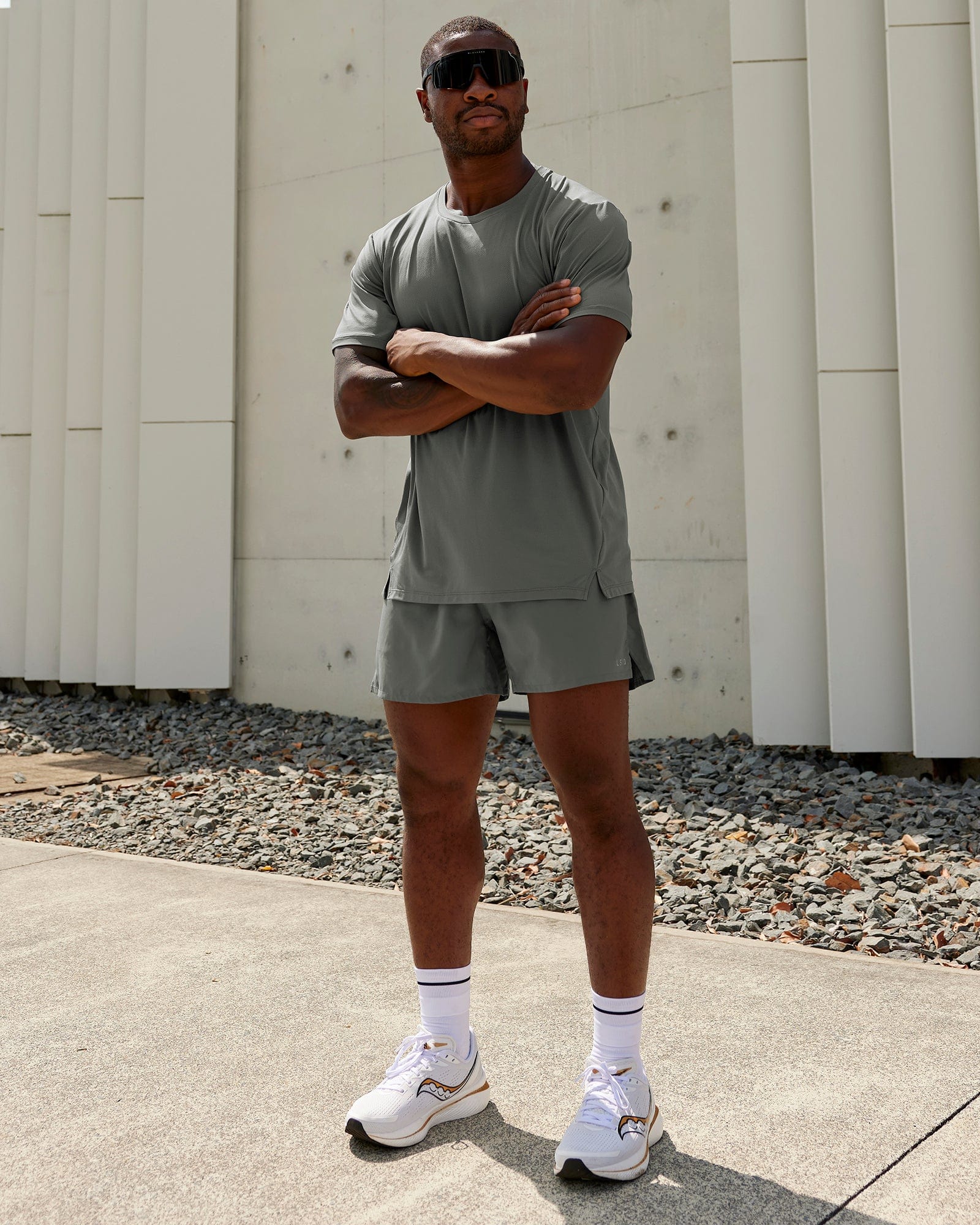 Man wearing Pace 5" Lined Performance Shorts - Graphite-Reflective