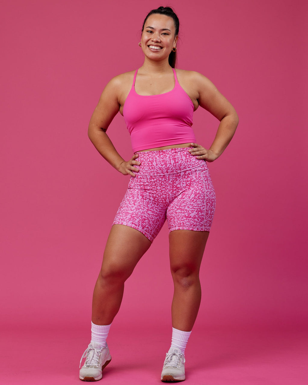 Woman wearing Twist Shelf Bra Tank - Ultra Pink