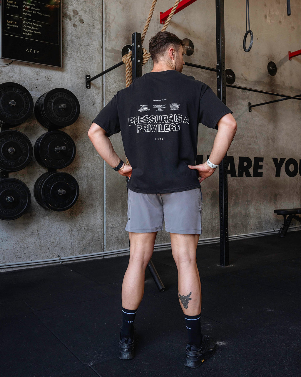 Man wearing Unisex Washed Pressure Heavyweight Tee Oversize - Black-White