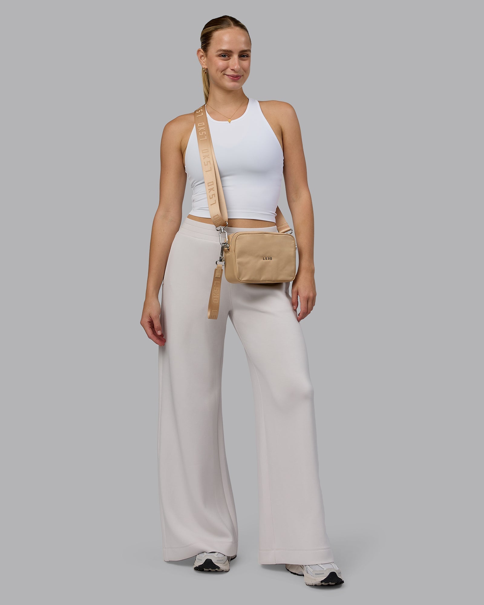 Woman wearing Go-To Shoulder Bag - Oat Milk