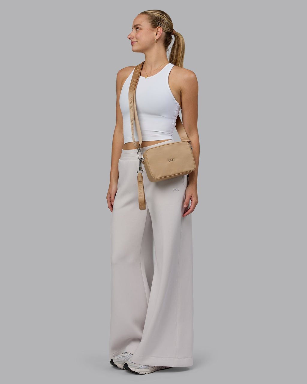 Woman wearing Go-To Shoulder Bag - Oat Milk