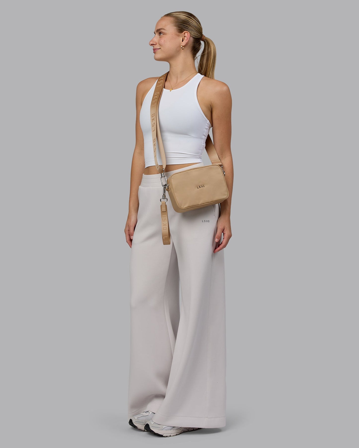 Woman wearing Go-To Shoulder Bag - Oat Milk