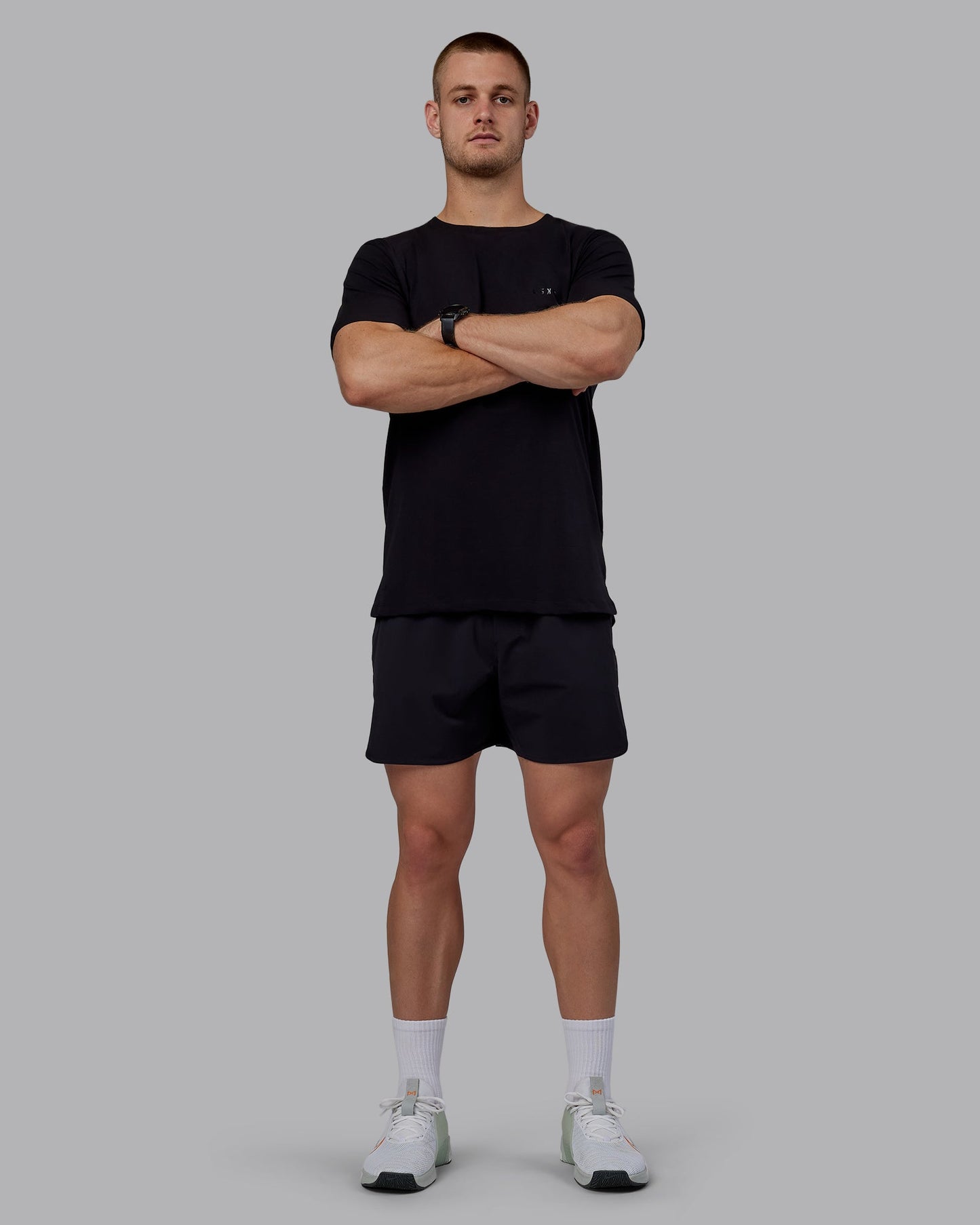 Man wearing Lift 6" Performance Shorts - Black-Reflective