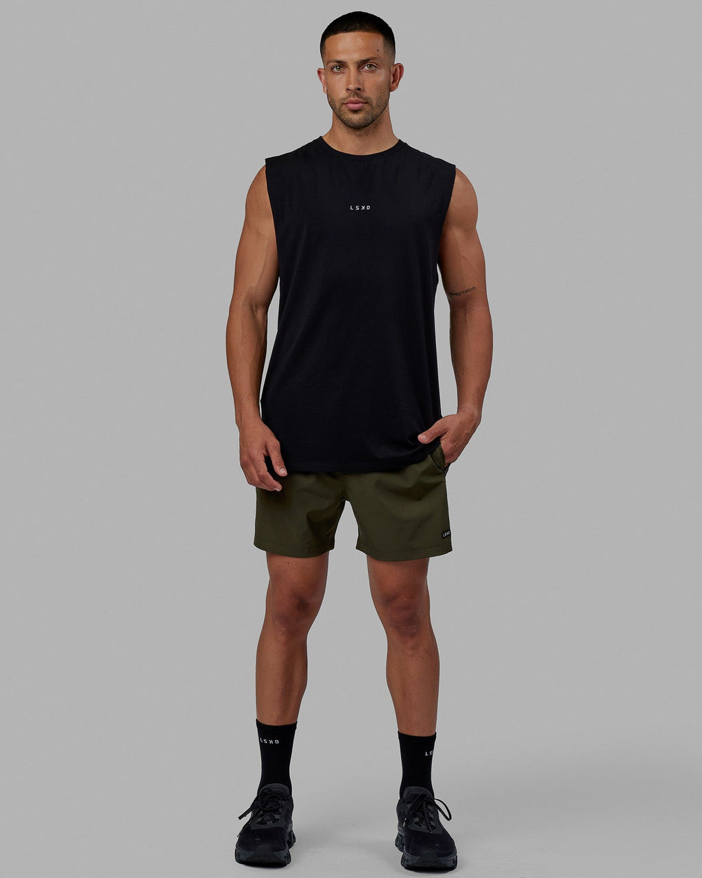 Man wearing Base FLXCotton Tank - Black