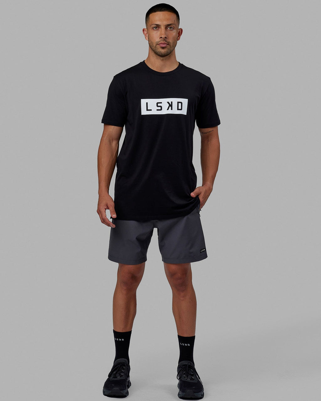 Man wearing Strength FLXCotton Tee - Black-White