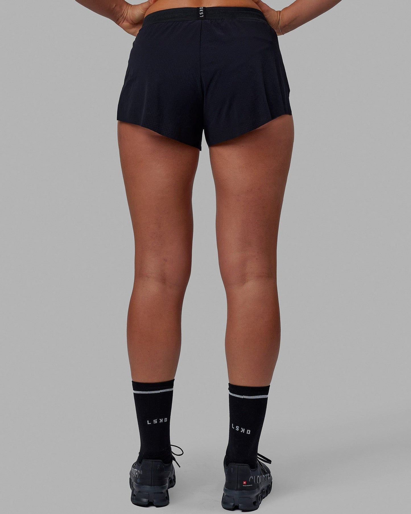 Woman wearing Accelerate Run Shorts - Black