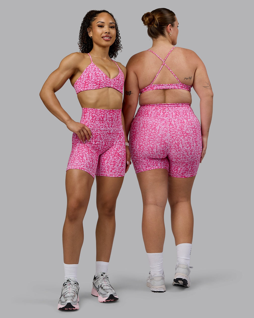 Woman wearing Aura Sports Bra - Patina-Ultra Pink