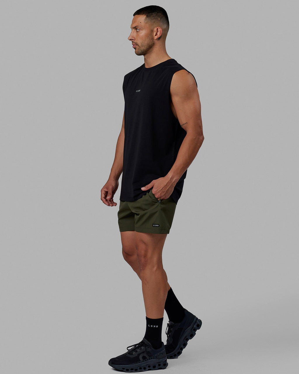 Man wearing Base FLXCotton Tank - Black
