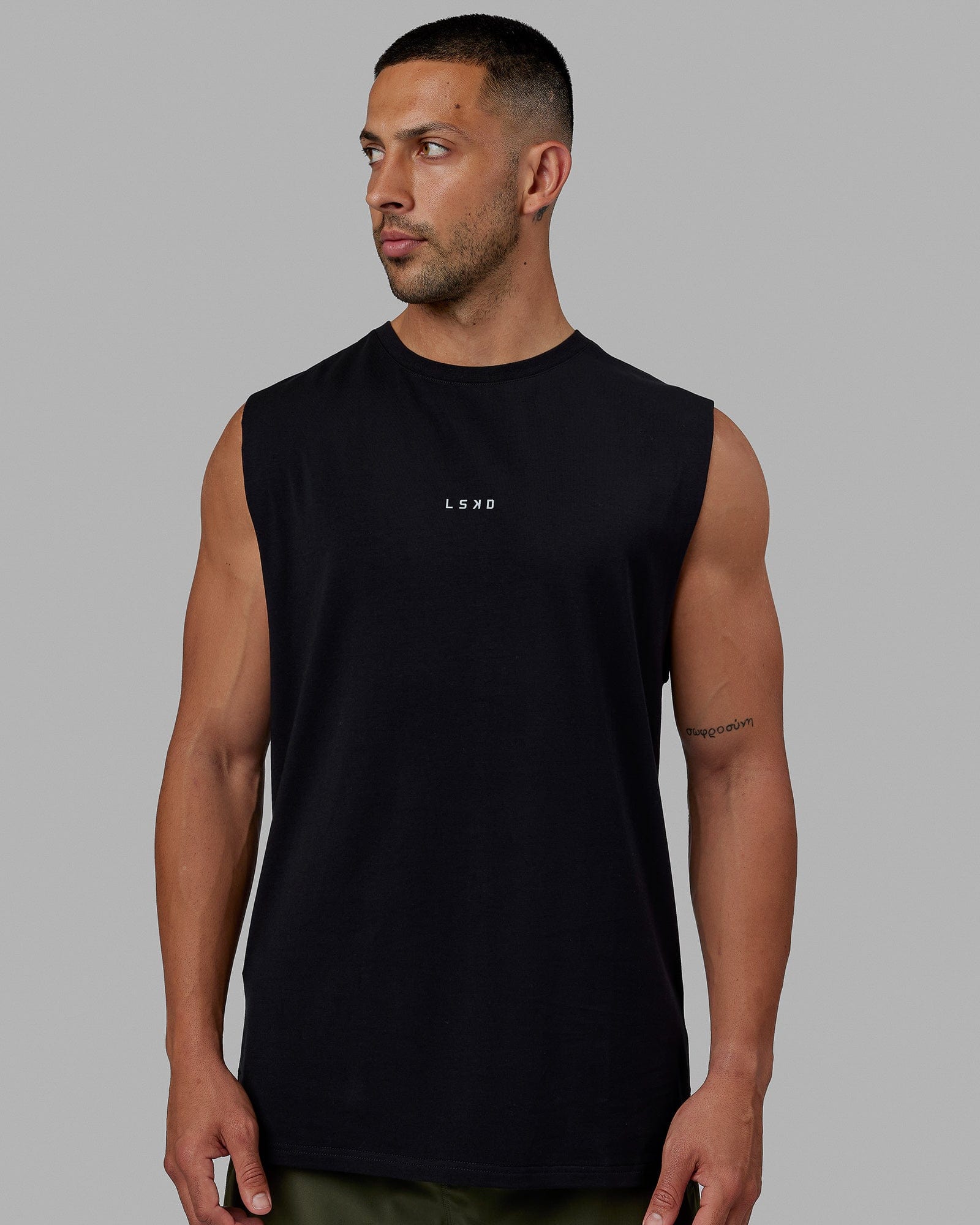 Man wearing Base FLXCotton Tank - Black