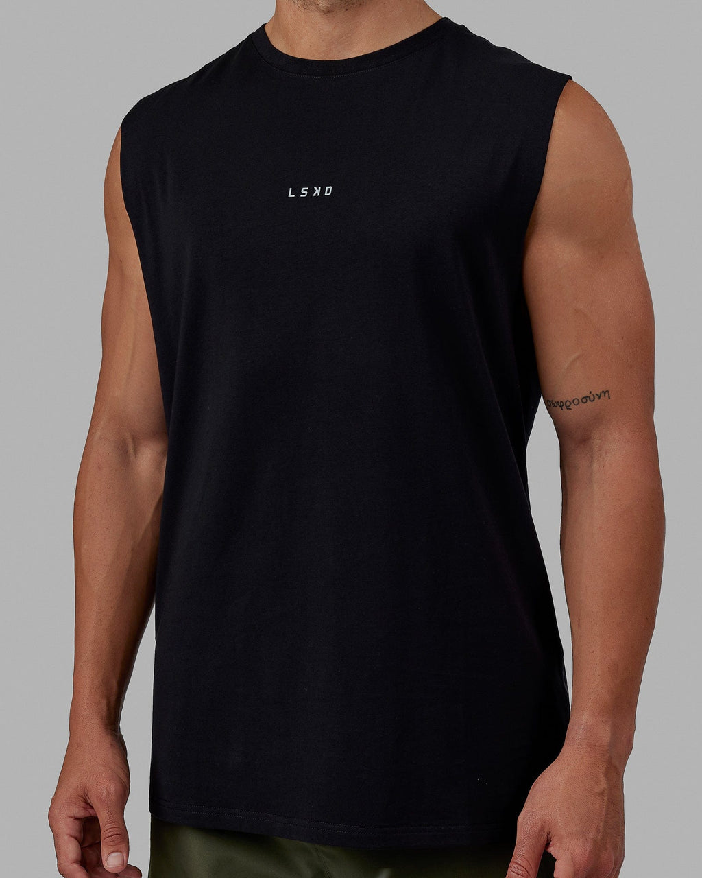 Man wearing Base FLXCotton Tank - Black
