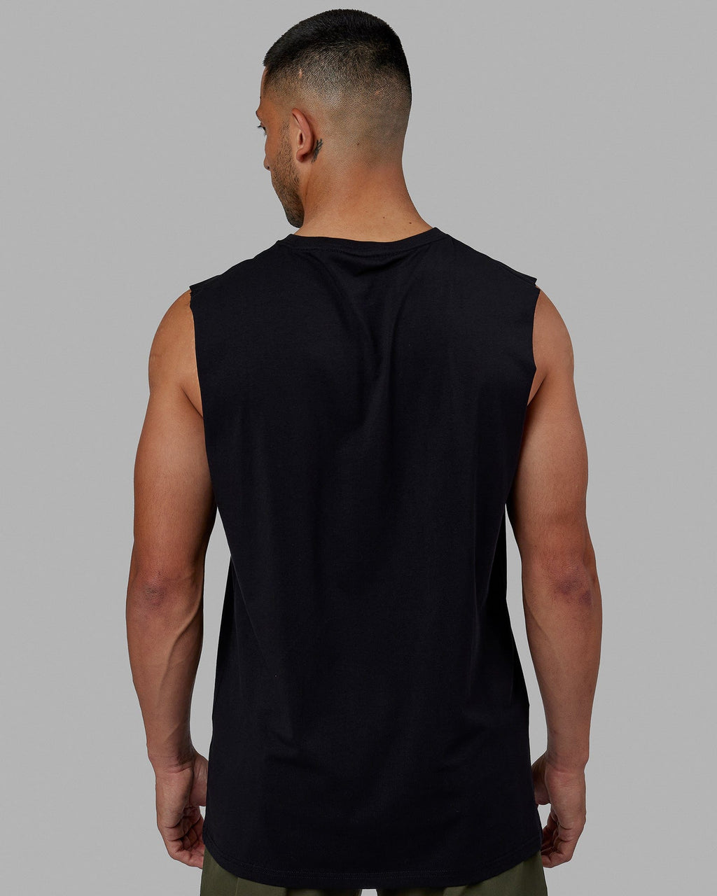 Man wearing Base FLXCotton Tank - Black