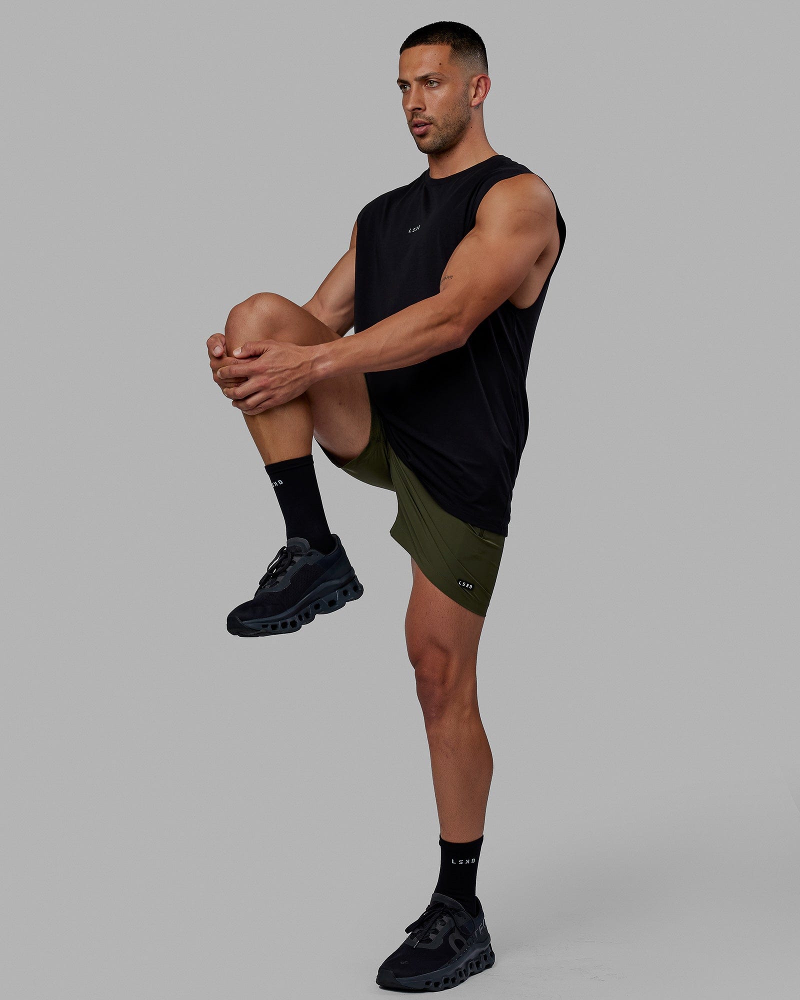 Man wearing Base FLXCotton Tank - Black