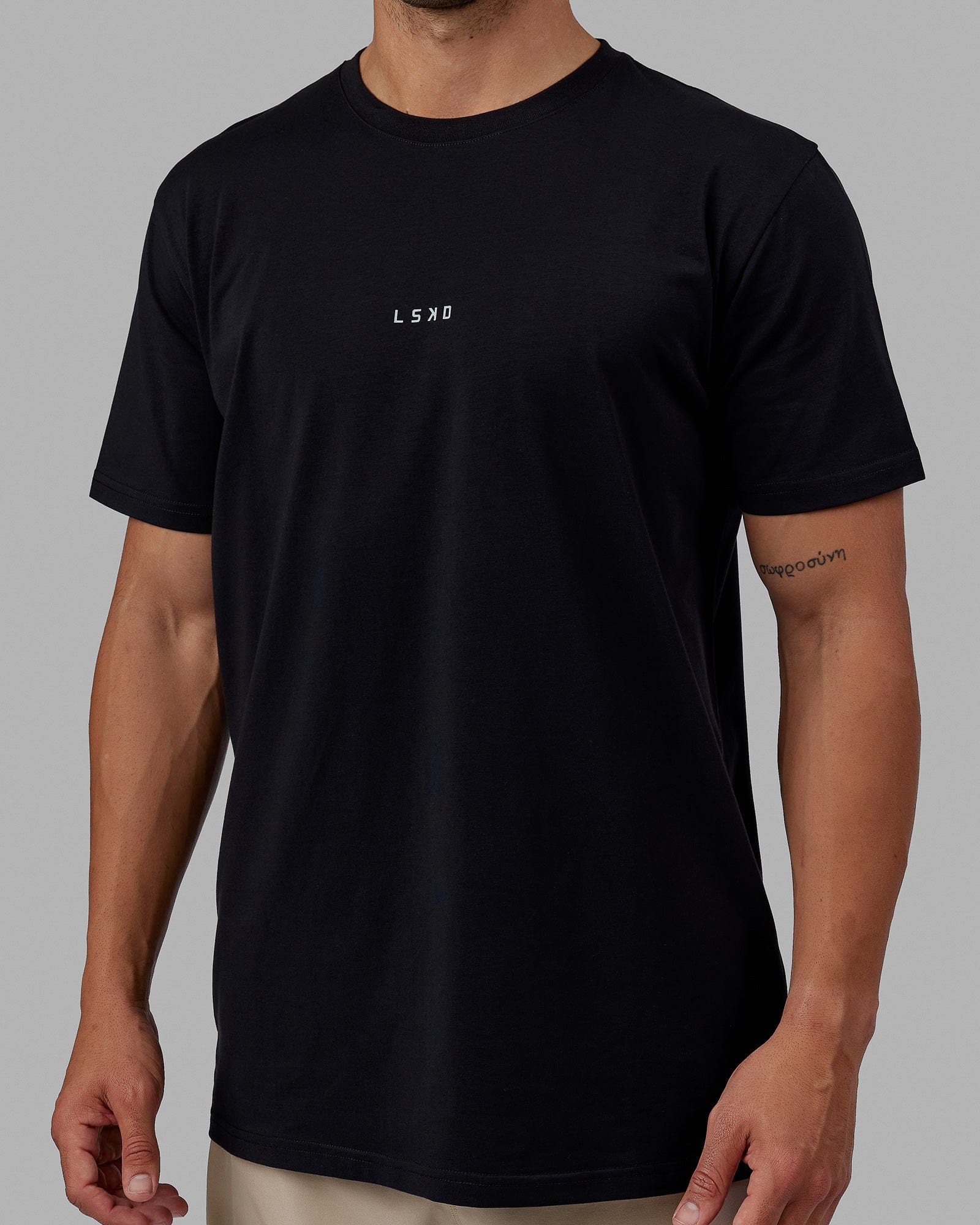 Man wearing Base FLXCotton Tee - Black
