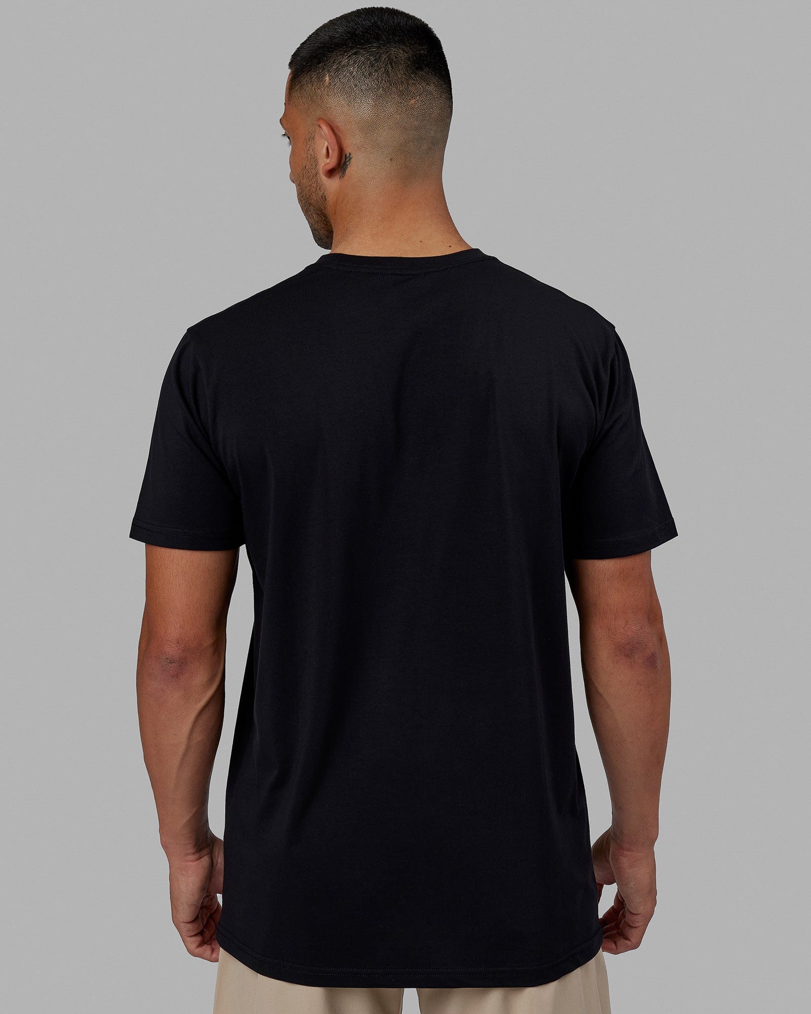 Man wearing Base FLXCotton Tee - Black