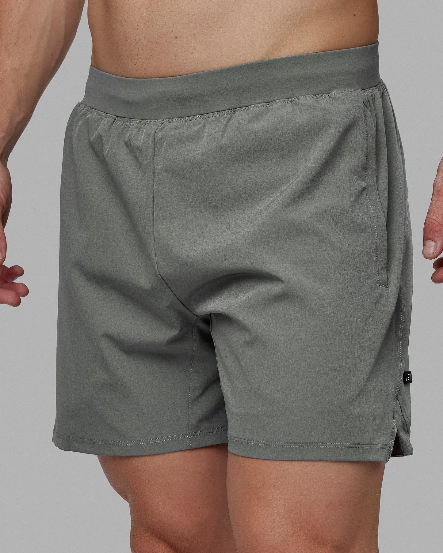Man wearing Challenger 6" Performance Shorts - Graphite