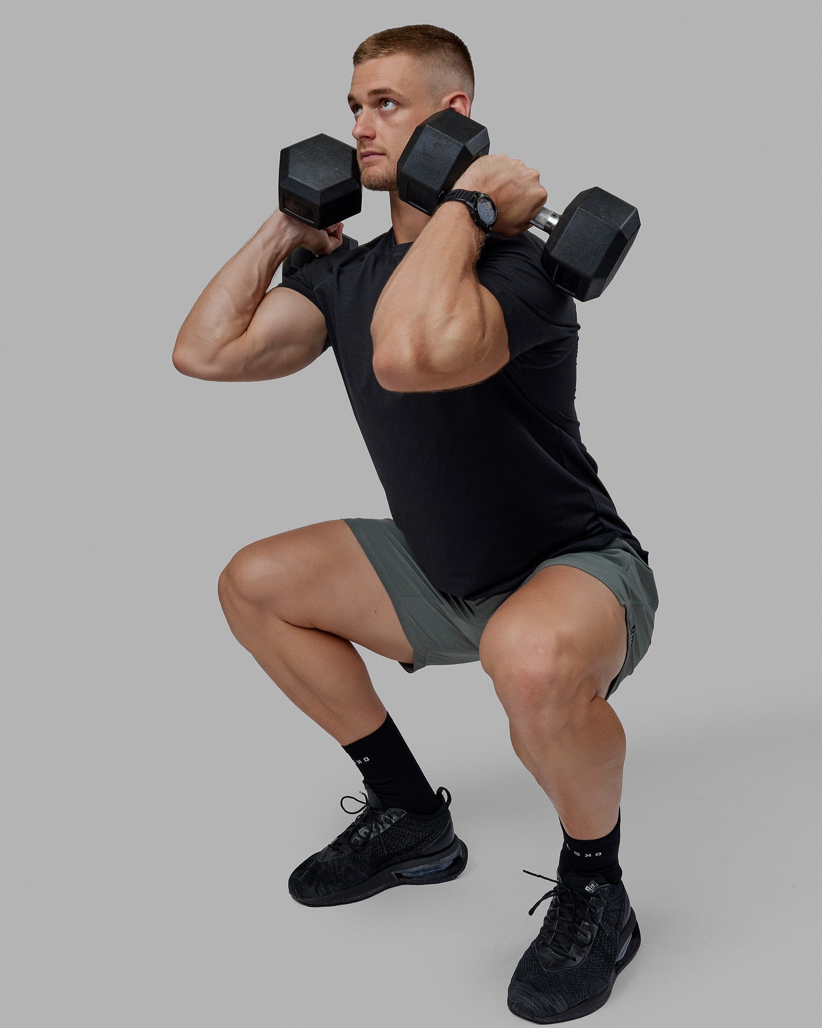 Man wearing Challenger 6" Performance Shorts - Graphite