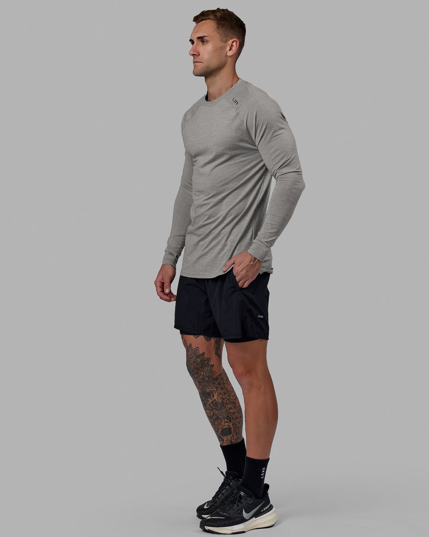 Man wearing Challenger 6" Lined Performance Short - Black