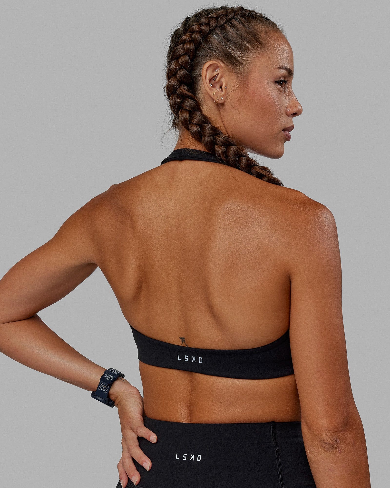 Woman wearing Challenger Sports Bra - Black