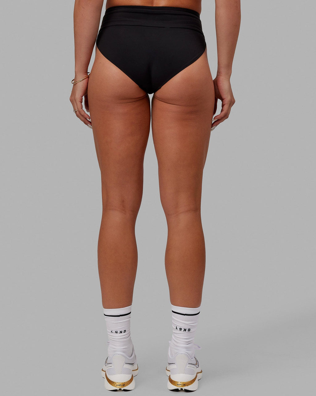 Woman wearing Elevate Sprinting Briefs - Black-White