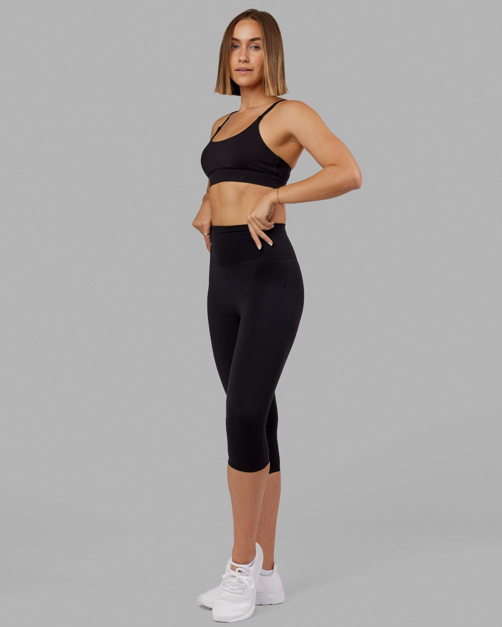 Woman wearing Elixir 3/4 Length Tight - Black No Logo