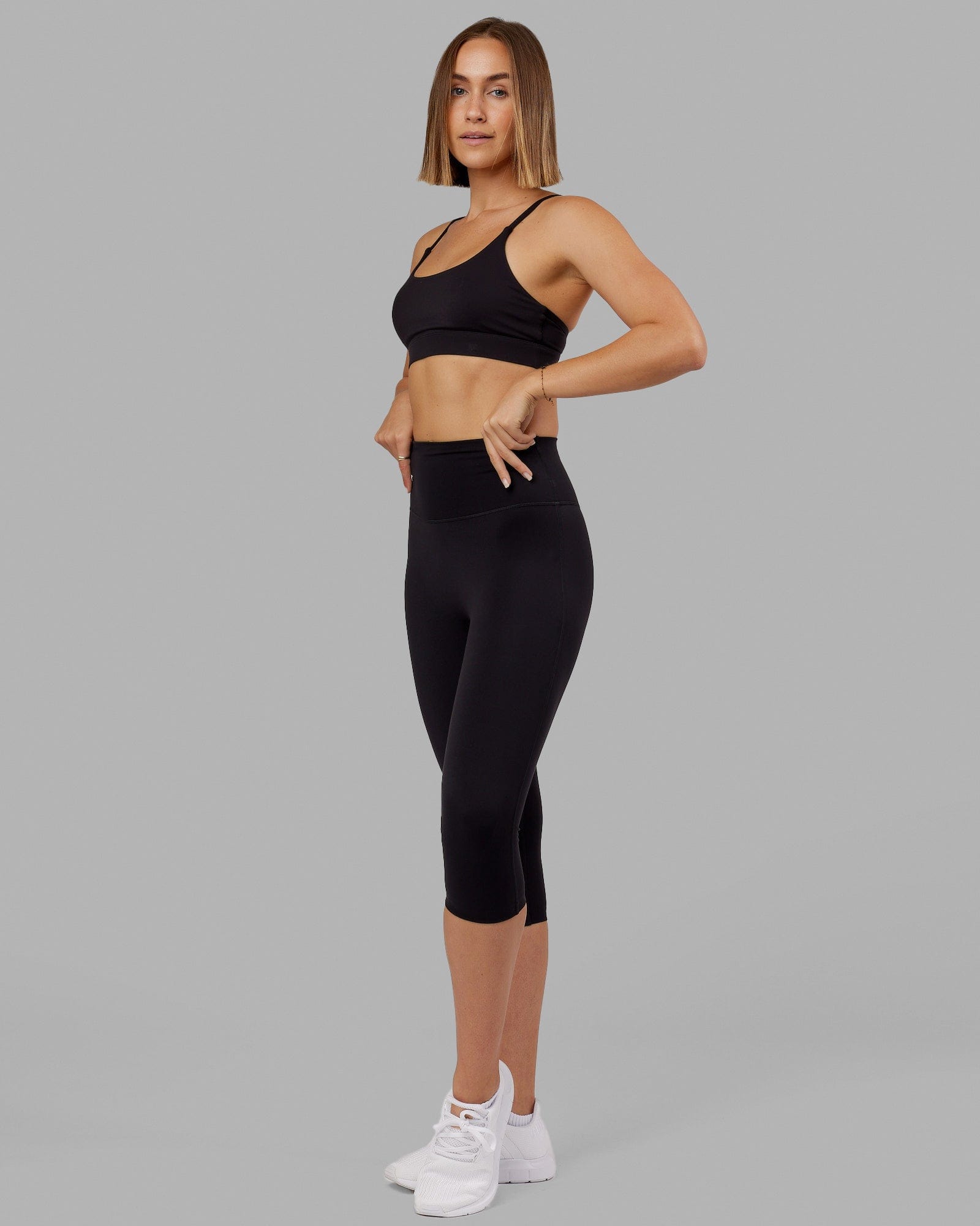 Woman wearing Elixir 3/4 Length Tight - Black No Logo