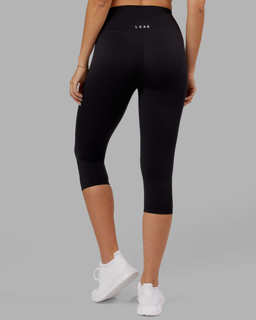 Woman wearing Elixir 3/4 Length Tight - Black No Logo