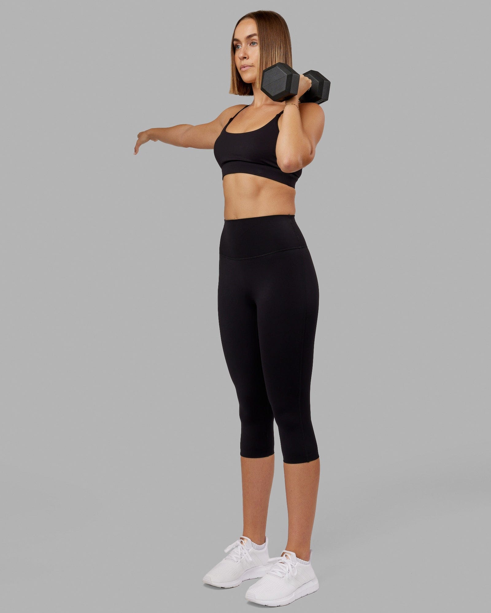 Woman wearing Elixir 3/4 Length Tight - Black No Logo