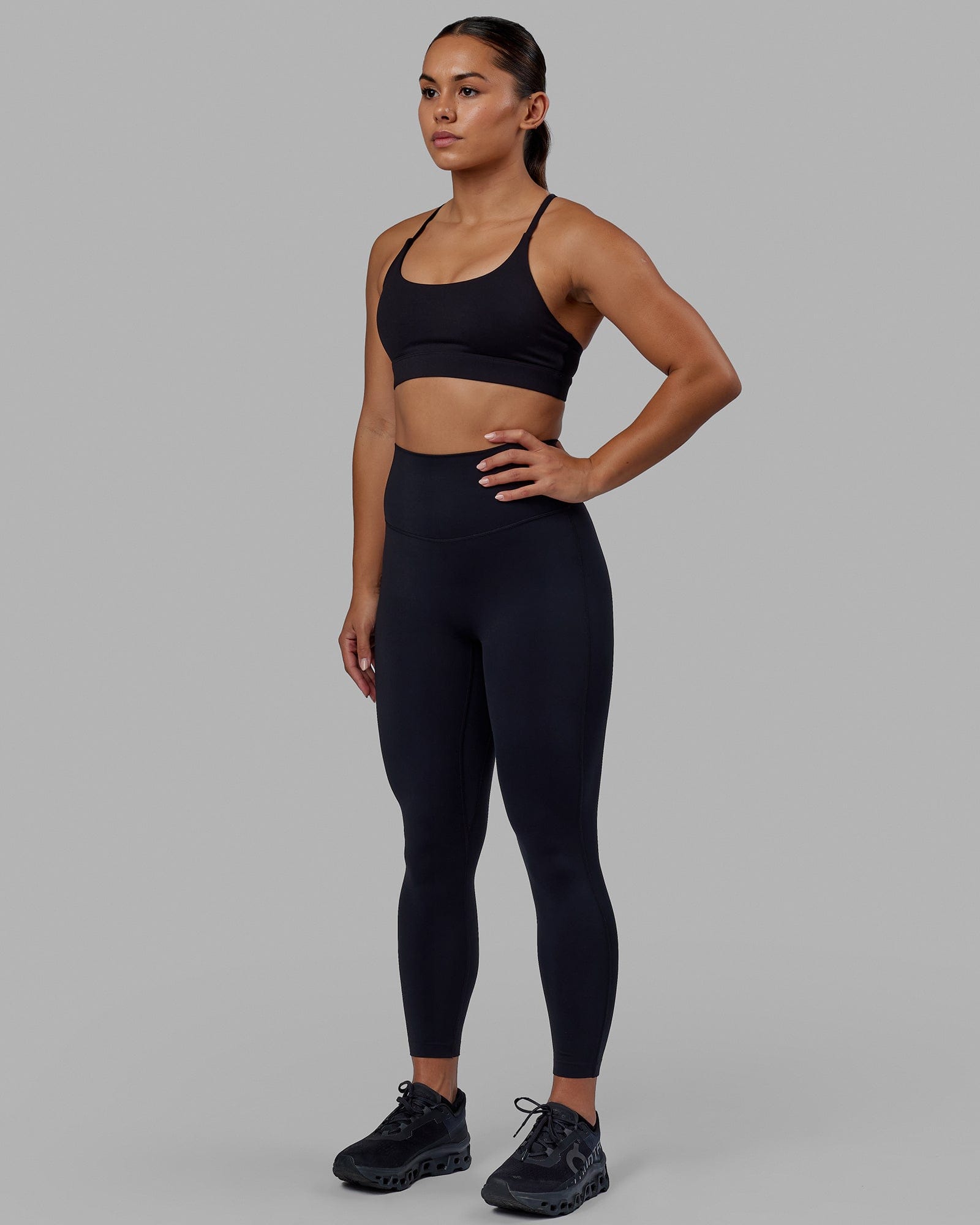 Woman wearing Elixir 7/8 Length Tight - Black No Logo