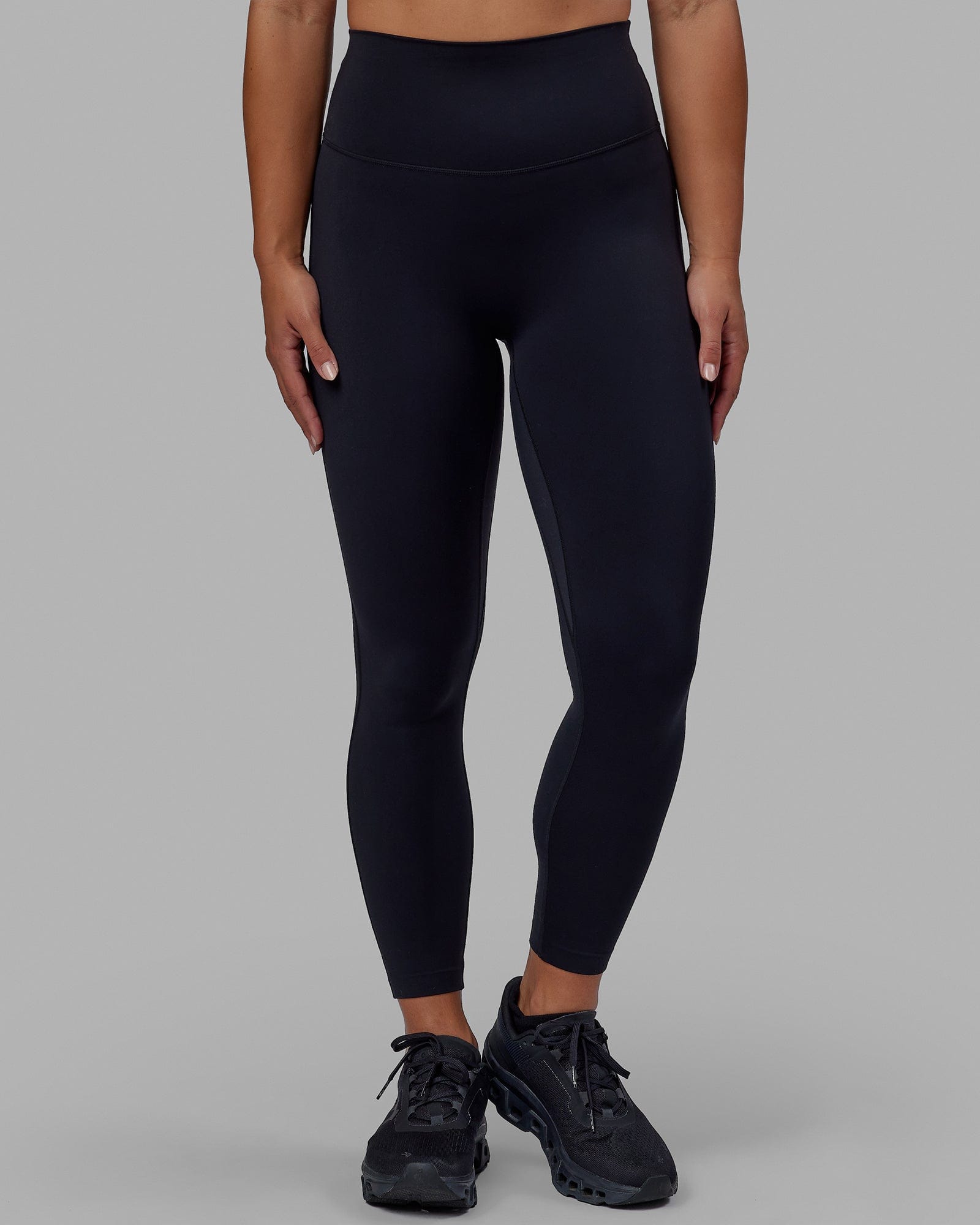 Woman wearing Elixir 7/8 Length Tight - Black No Logo