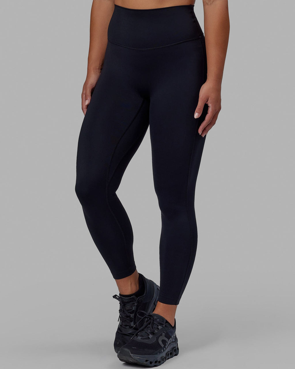 Woman wearing Elixir 7/8 Length Tight - Black No Logo