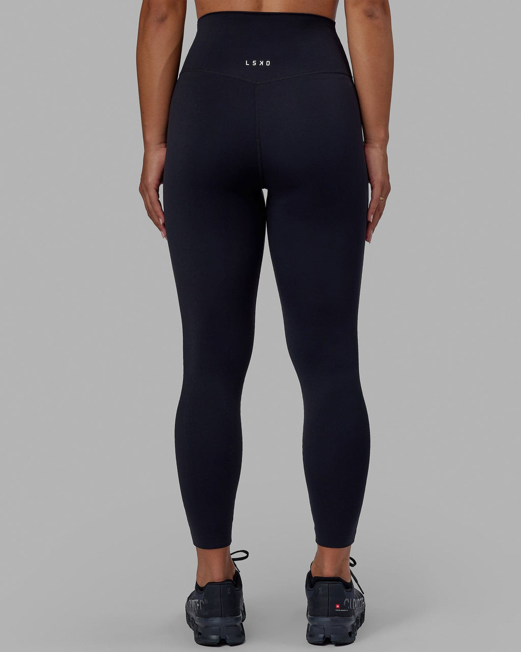 Woman wearing Elixir 7/8 Length Tight - Black No Logo