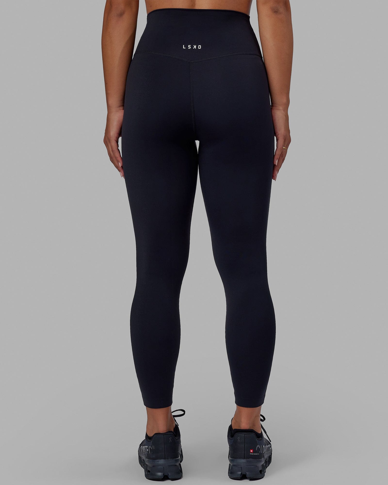 Woman wearing Elixir 7/8 Length Tight - Black No Logo