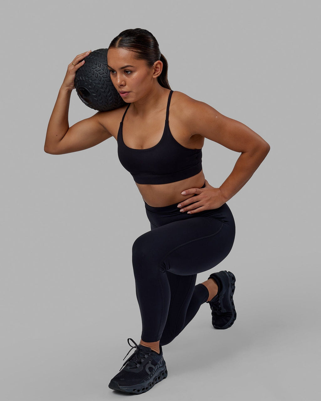 Woman wearing Elixir 7/8 Length Tight - Black No Logo