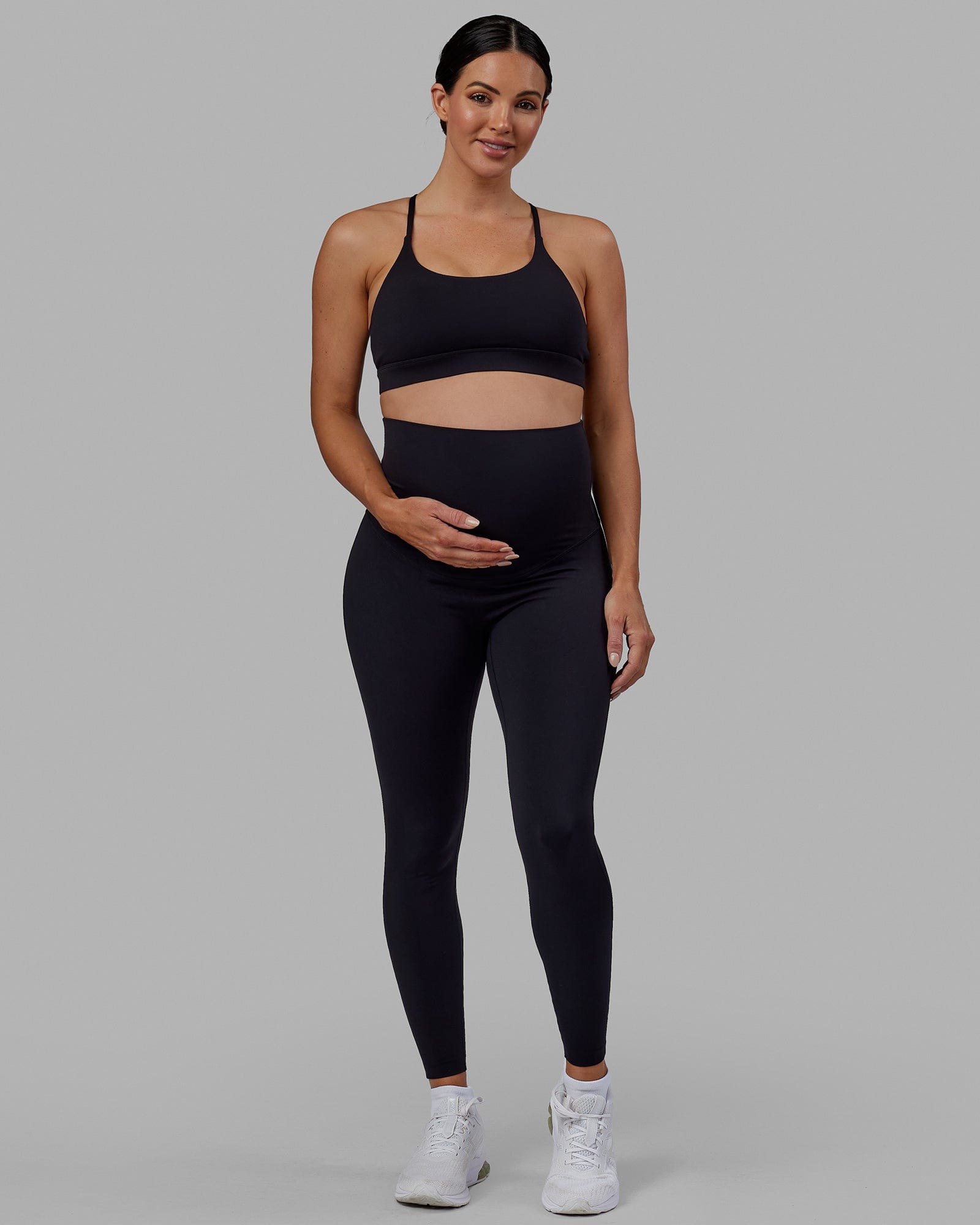 Woman wearing Elixir Full Length Maternity Tight - Black