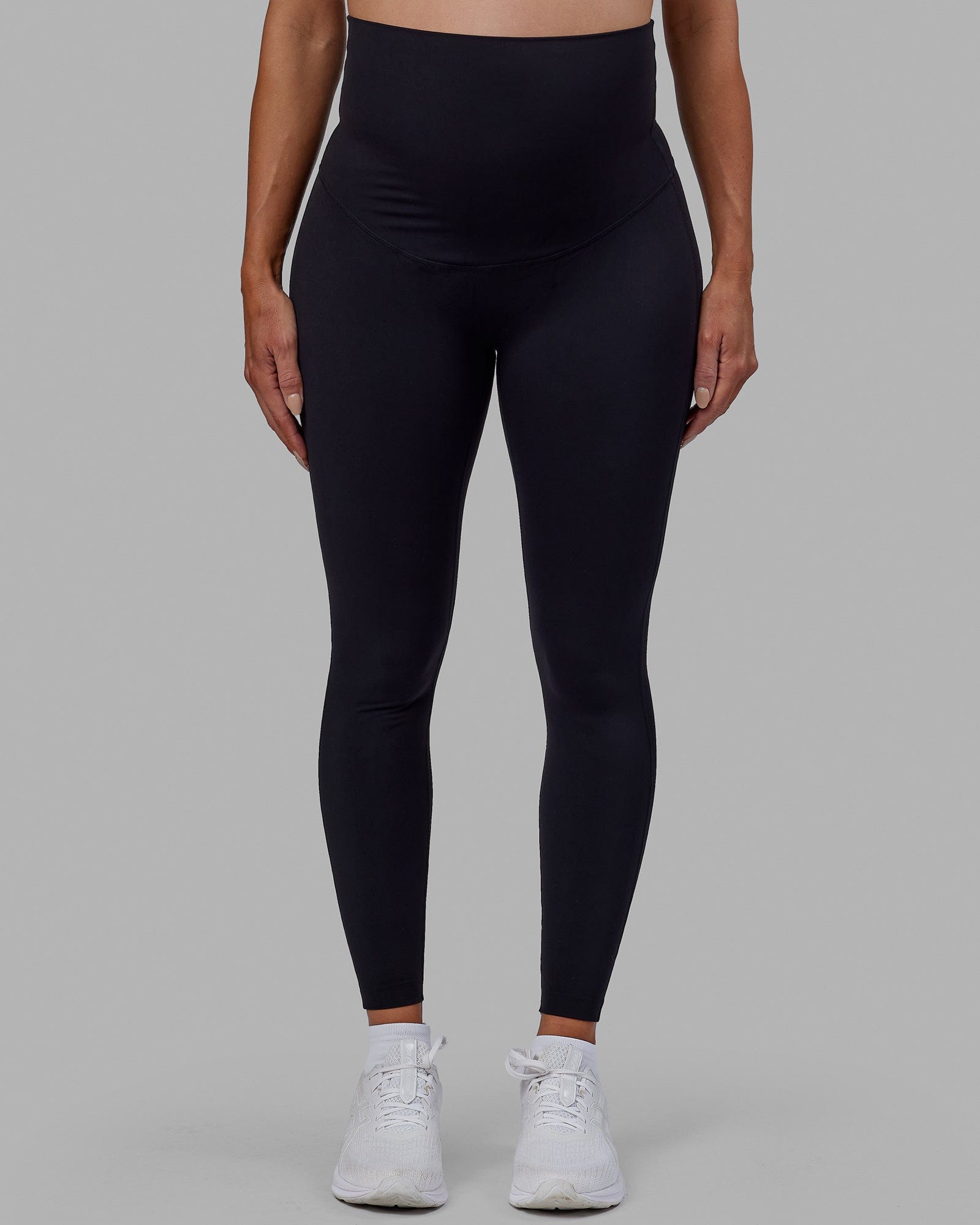 Woman wearing Elixir Full Length Maternity Tight - Black