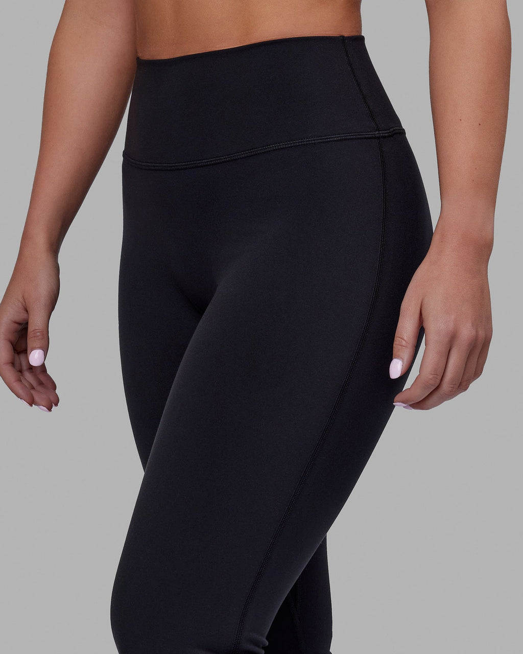 Woman wearing Everyday Flare Tight Petite - Black